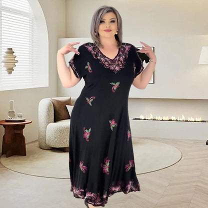 👗Sukienka Plus Size z dekoltem w szpic