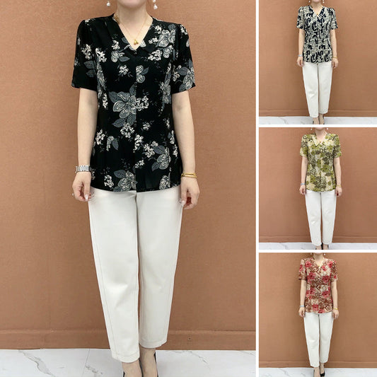 Elegancka bluzka z dekoltem w serek i nadrukiem, zapinana na guziki